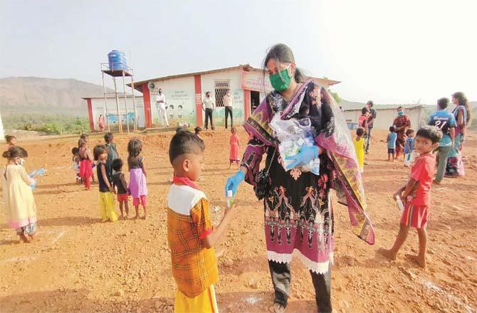 Rehana Sheikh with tribal children. (Inset) During duty.Picture:Inquilab